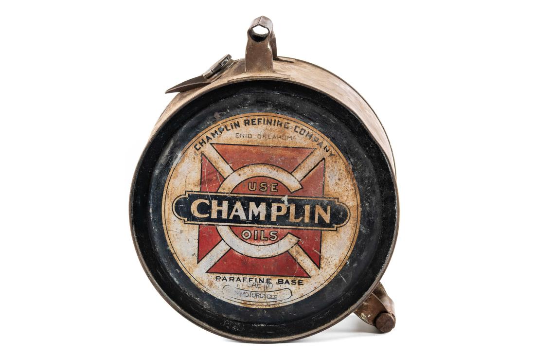 Champlin Motor Oil Rocker Can: Empty 5 gallon rocker. Average color with fading and rust on both sides. Still displays nicely. 17"X14" Rating: 7.25 Est. $300-$600