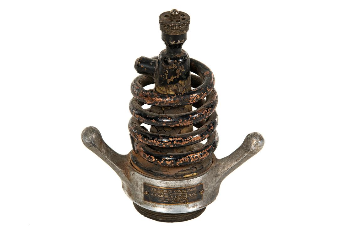 Rare Burke Condenser Radiator Cap: Rare Burke condenser radiator cap. Accessory for Model T Ford, it was designed to take the steam and turn into water for reuse. Nice original condition. Shows areas of paint loss and wear throughout.