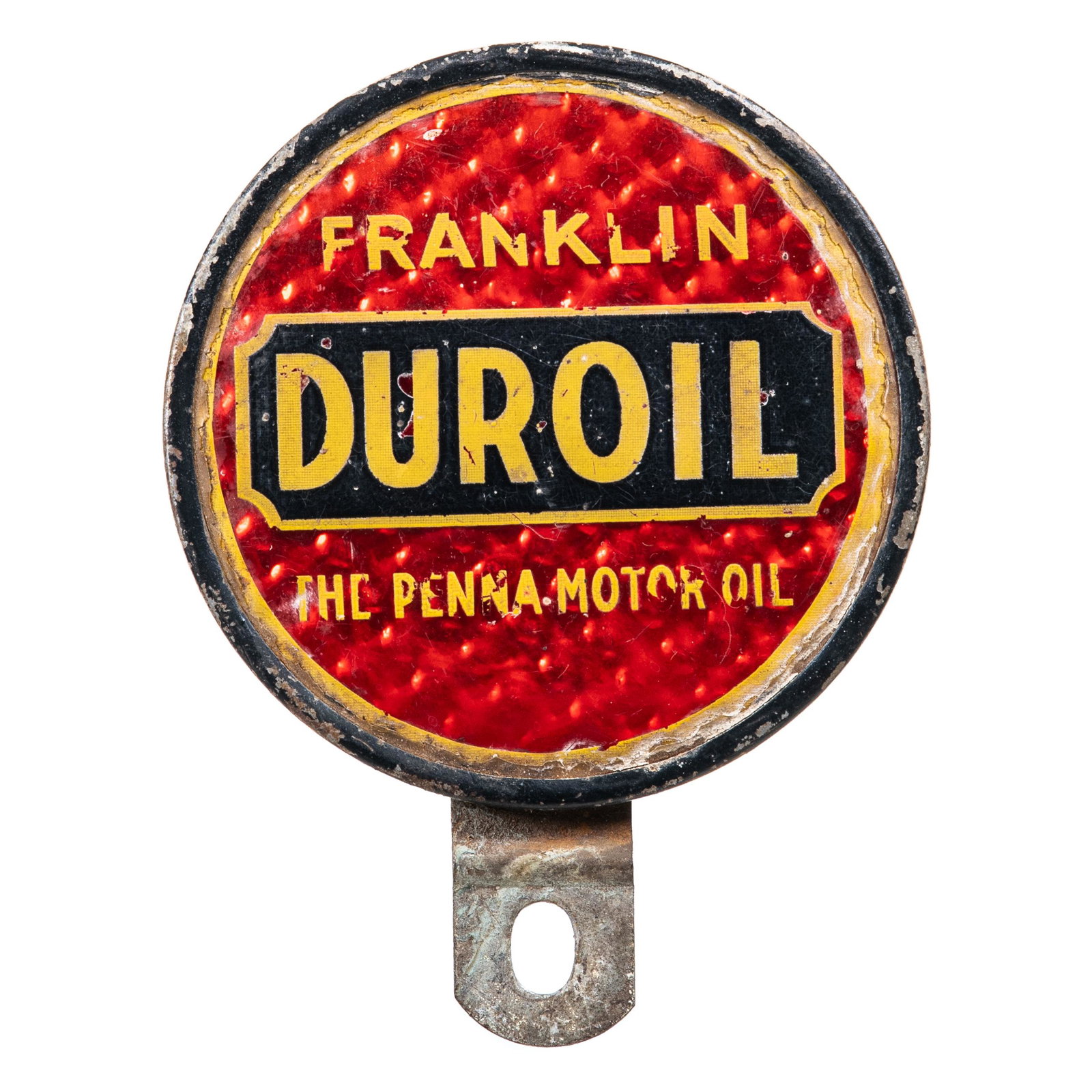Franklin Duroil License Plate Topper: Celluloid over tin. Shows areas of wear and color loss. It also shows areas of paint loss along the perimeter. Marked Dura-Products. Tough piece to find that displays well. Measures: 4.5"X3.5" Rating: