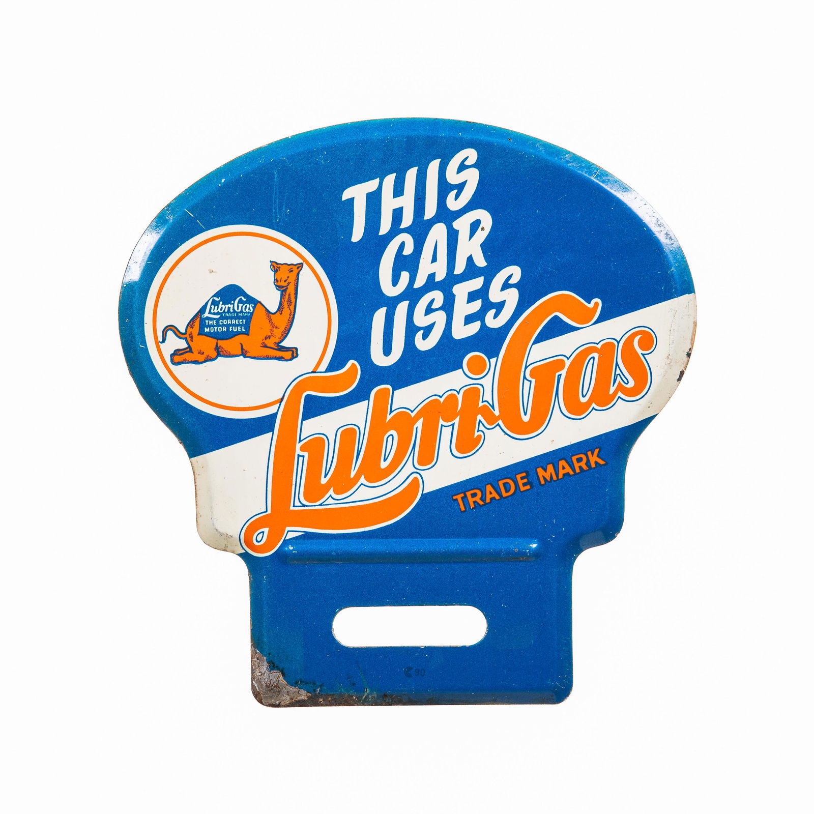 Lubrigas License Plate Topper: Metal license plate topper. Good color and cool camel graphic. Minor scratching. Paint loss on the bottom edge. Measures: 4.75"X4.75" Rating: 8 Est: $100-$200