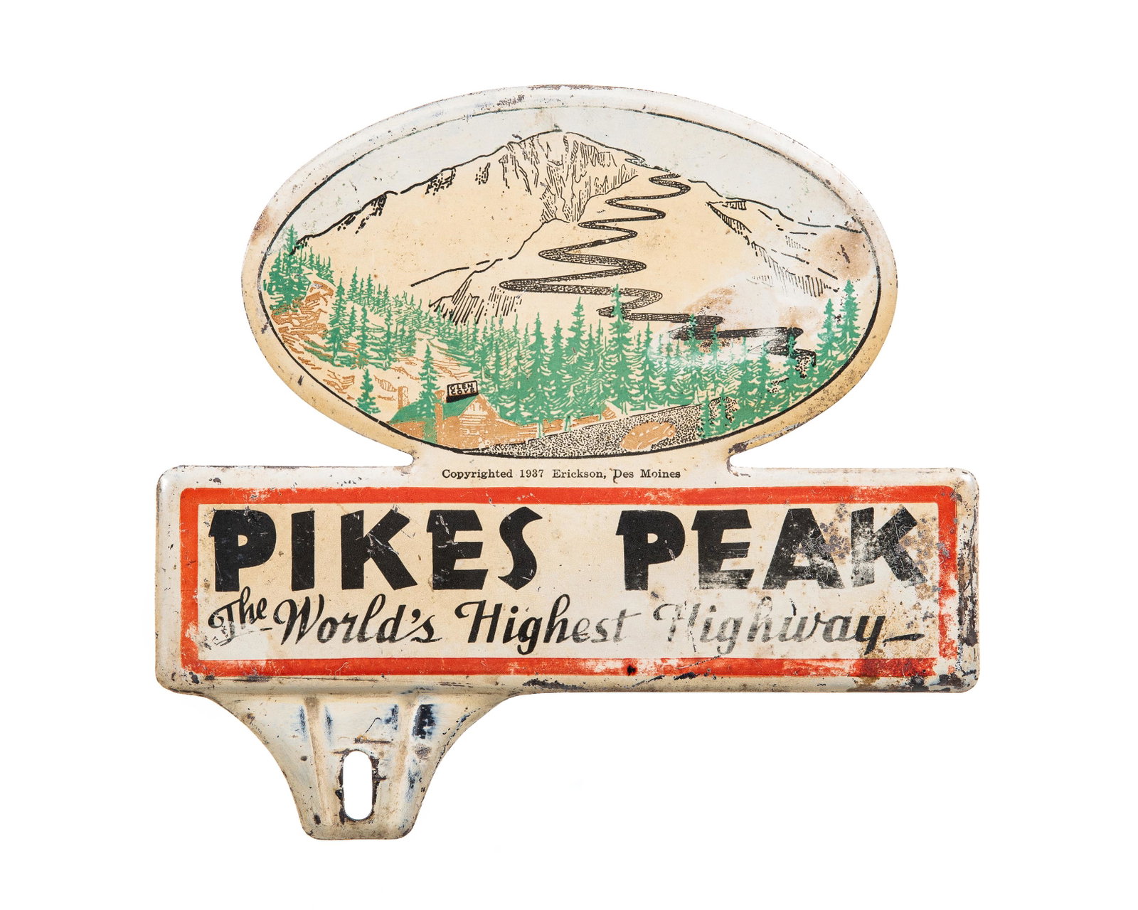 Pikes Peak License Plate Topper: Metal license plate topper. Sweet mountain graphics. Shows areas of areas of paint loss and discoloration. Wear throughout. Measures: 6.25"X5.75" Rating: 6.75 Est: $75-$150