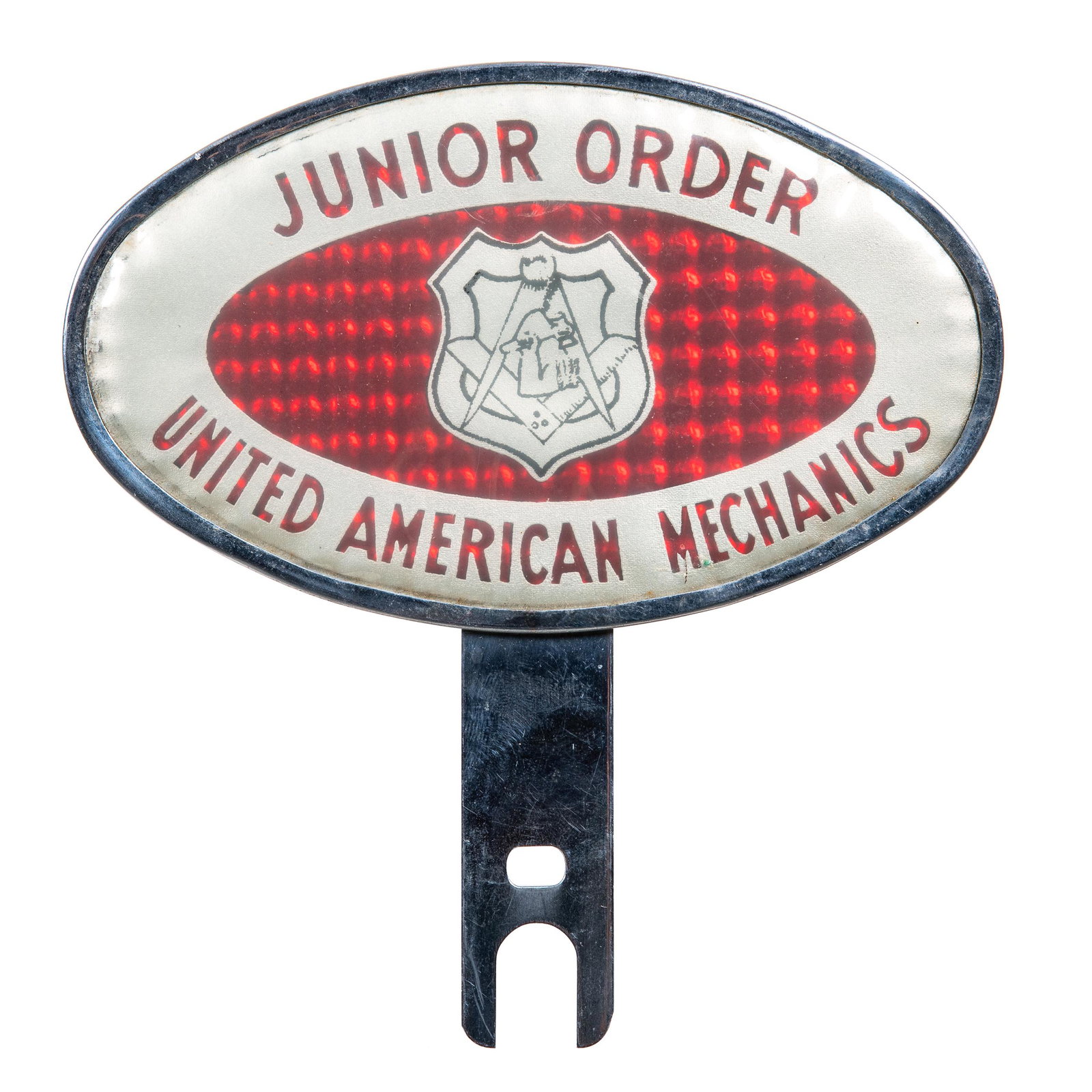 Junior Order License Plate Topper: Metal and plastic license plate topper. Good condition. Minor wear and surface scratching. Measures: 6.25"X6.5" Rating: 7.5 Est: $50-$100