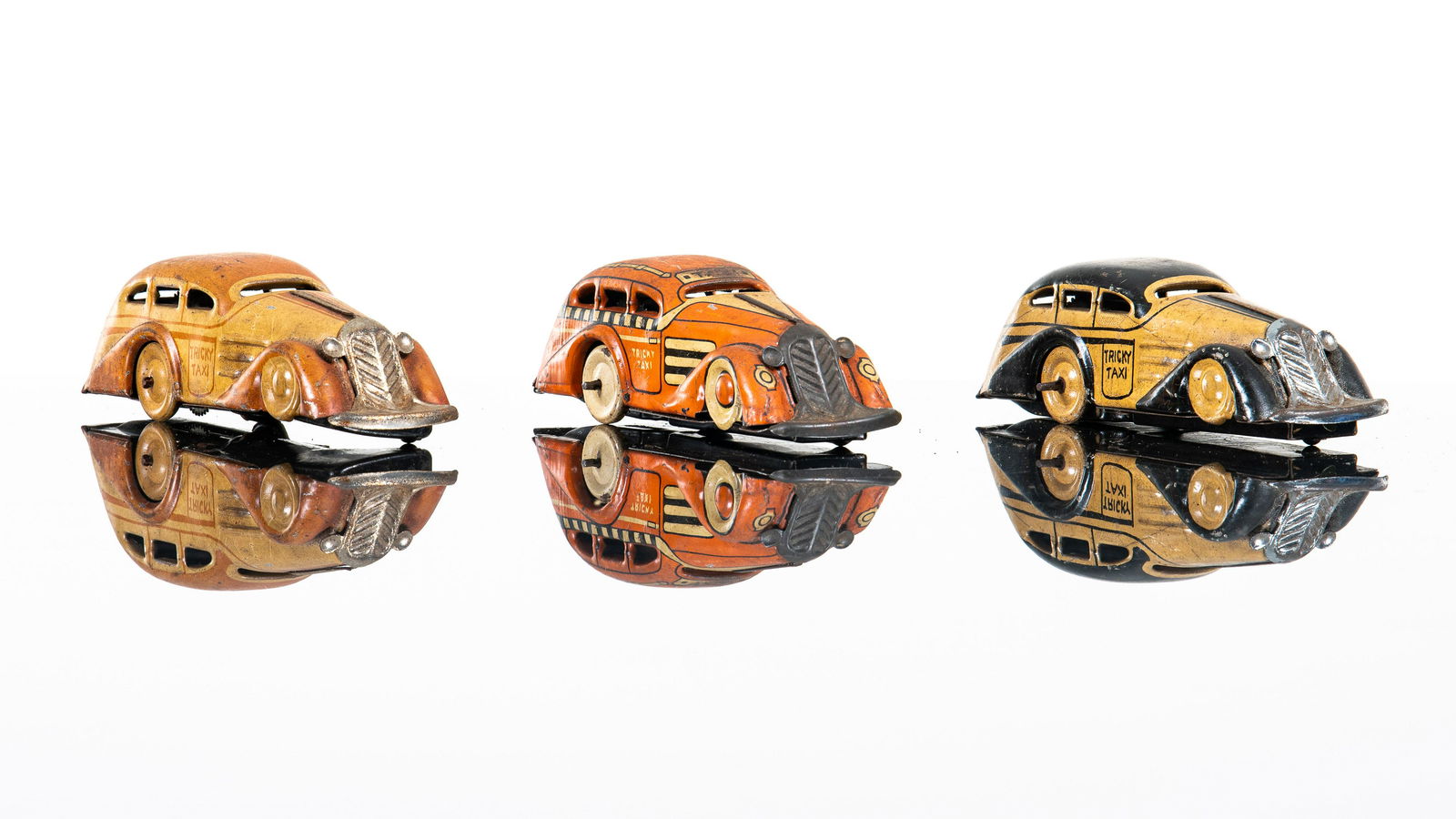 Lot Of Three Marx Tricky Taxi Tin Toys (1 of 2)