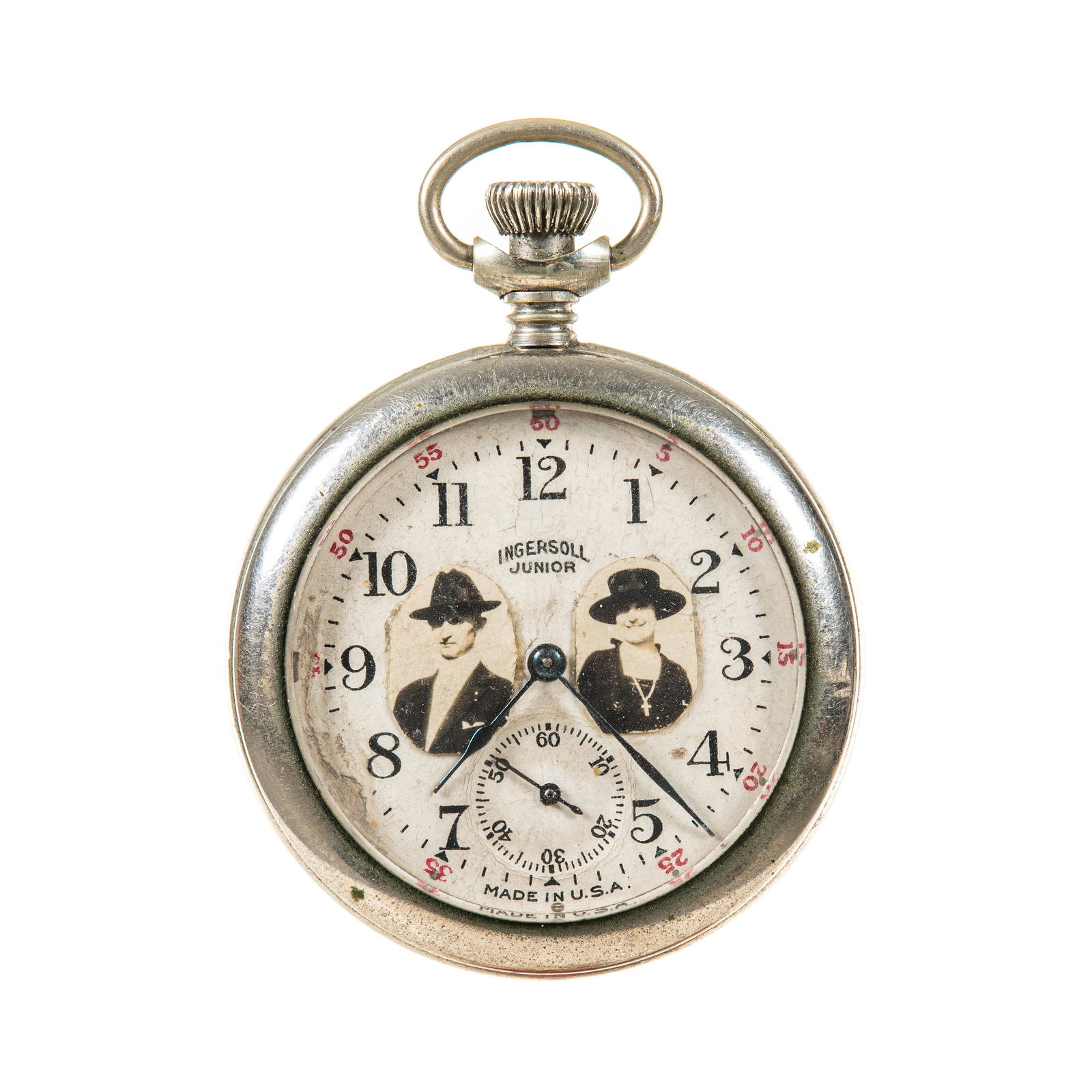 Ingersoll Junior: 54130623 nickel silver case, guarantee paper, has two pictures glued to dial, back case initialed A P. needs cleaned, runs and stops