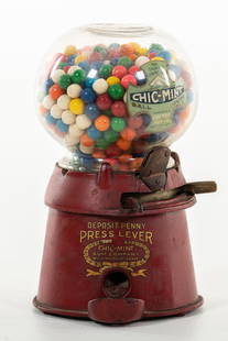 Chic-Mint One Cent Gum Ball Vending Machine: Penny gum ball machine. Has good color and is mostly full. Minor wear throughout. Has some edge/base wear. Displays well. Measures: 11.5"x7" Rating: 8.25 Est: $350-$700