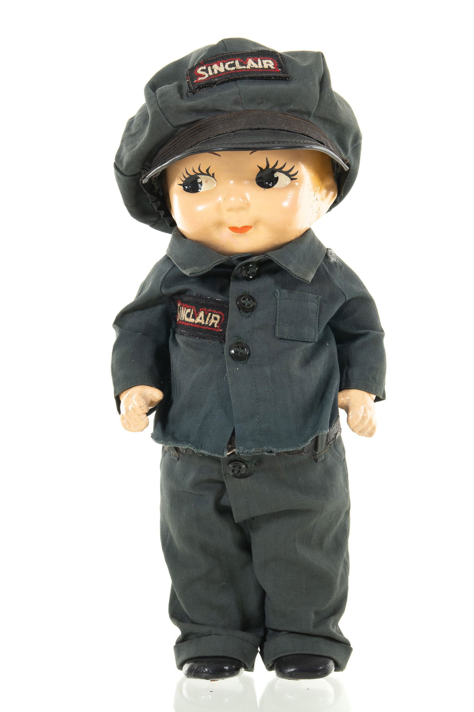 Buddy Lee Sinclair Doll: Buddy Lee doll with Sinclair uniform. It has good color with minor wear fading. Nice doll that displays well. Measures: 12"X6" Rating: 8.25 Est: $100-$300