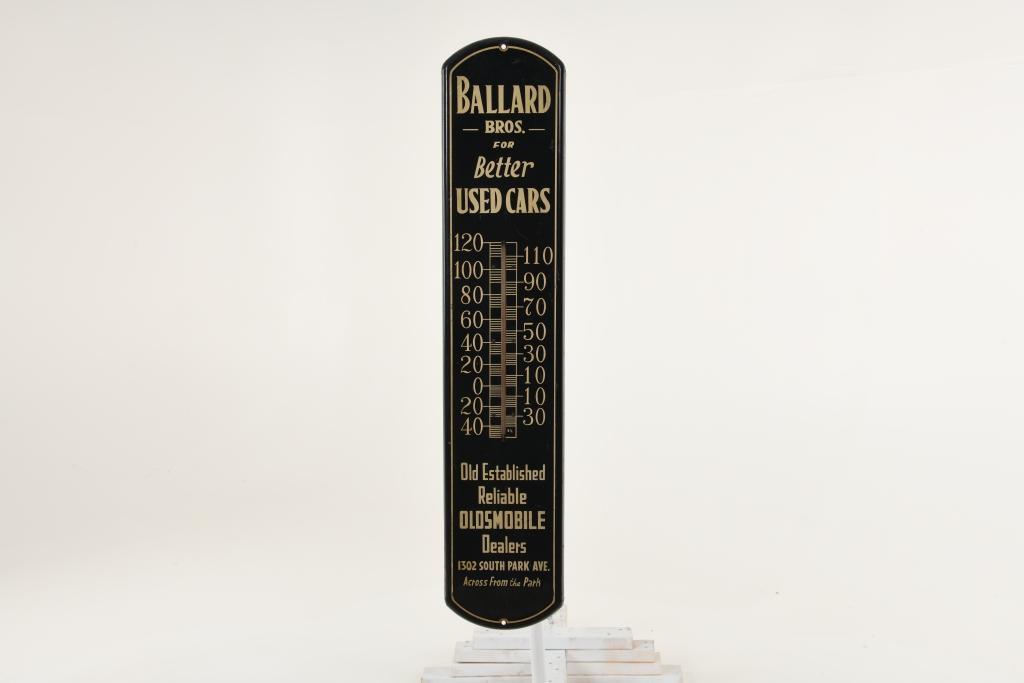 Ballard Bros. Oldsmobile Thermometer: SST. Good color and gloss. Has light wear and scratching. Small areas of surface rust along the edges. Bottom address has been painted over. Thermometer works. Neat piece. Measures: 38.75" x 8" Rating