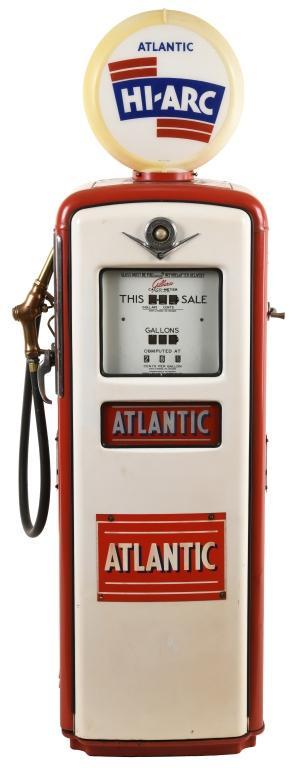 Gilbarco Atlantic Gas Pump: Restored. Nice older resto with wear and paint loss. Looks to retain all original parts excluding ad glass & globe. It displays very well with original pump plates. Measures: 76"X28" Rating: Restored