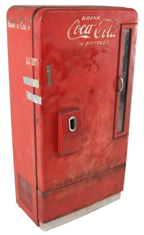 Coca Cola Have A Coke Vendo 110: Vendo machine. Appears to have old repaint. No cord. Working condition is unknown. Missing front legs. Door does not latch. No keys. Measures: 64.5" x 32.5" Rating: 6.75 Est: $150-$300