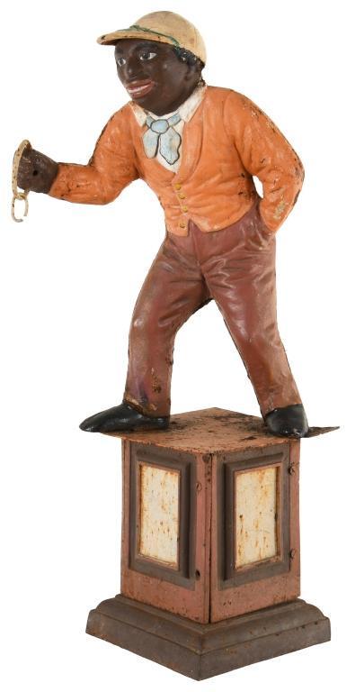 Black Americana Hitching Post: Cast hitching post. Age is unknown. Has a nice look. Shows wear and rust. Displays well. Measures: 33.5" x 10.25" Rating: 7 Est: $150-$300