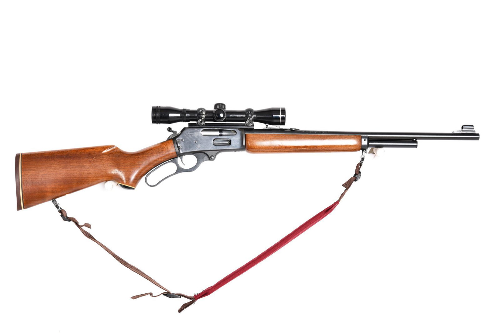 Marlin Model 336ER 356 Winchester Caliber Lever Action: 2/3 mag. 20" Barrel. Marlin butt pad. Tasco Straight 4 power scope. Very rare caliber. Excellent used condition. 95% blue.