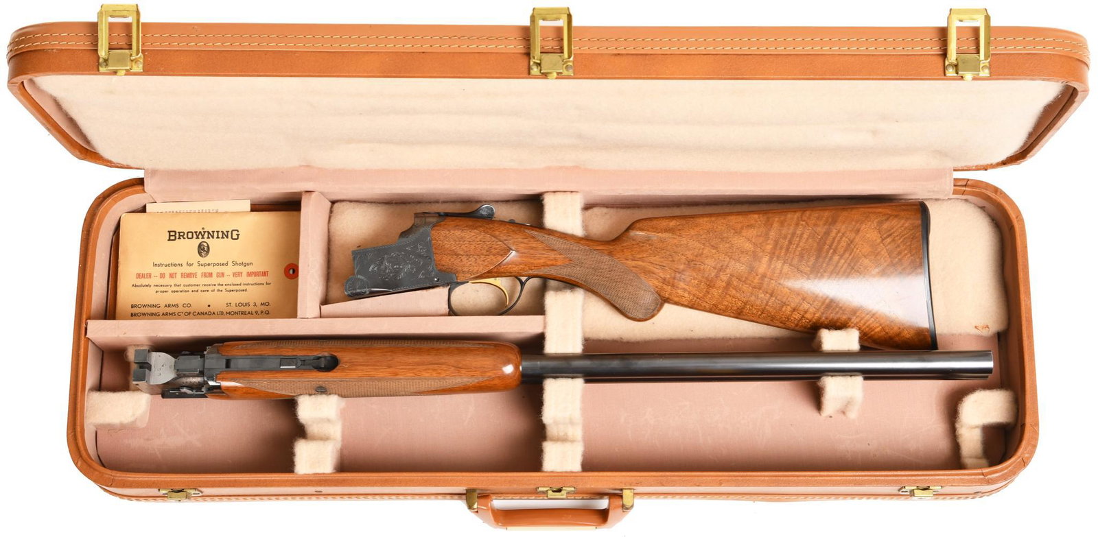 Postwar Browning Superposed 12 gauge Over Under Shotgun: 28in. full and modified vent ribbed barrels. Has been shot. Has a few handling marks. In very good condition. Very nice wood. Comes in Browning factory hard case.