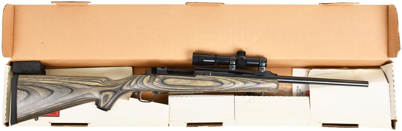 Ruger Model 77 Mark II Scout Rifle 300 Winchester Short: Charles Daily long eye relief scope on Ruger rings. Green laminate stock. Comes in factory box w/ paperwork.