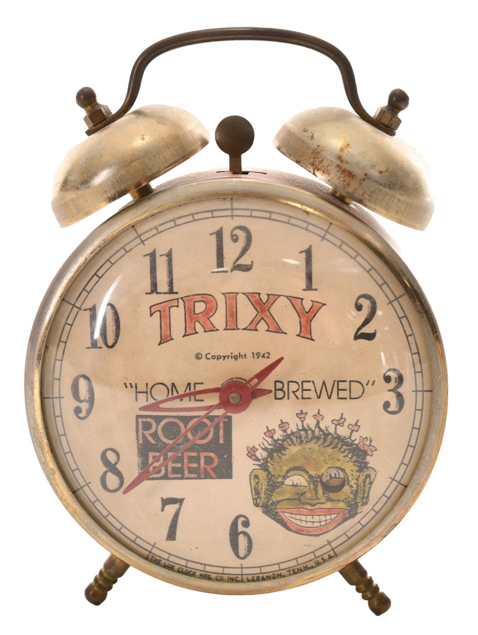 Trixy Root Beer Windup Alarm Clock: In good condition, face is slightly faded, works, face and case are marked the same, 6" tall. Age unknown.