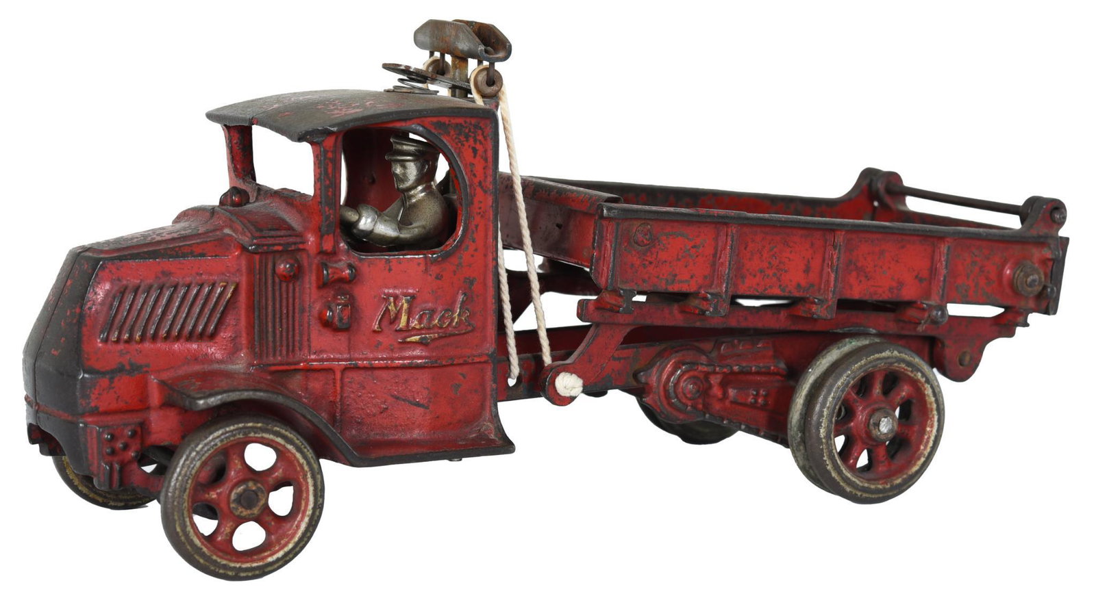 Arcade Mack C-Cab Dump Truck w/Duals Cast Iron Toy: Is in good condition with no breaks or repairs, has heavy paint wear, 12"L., rated 7