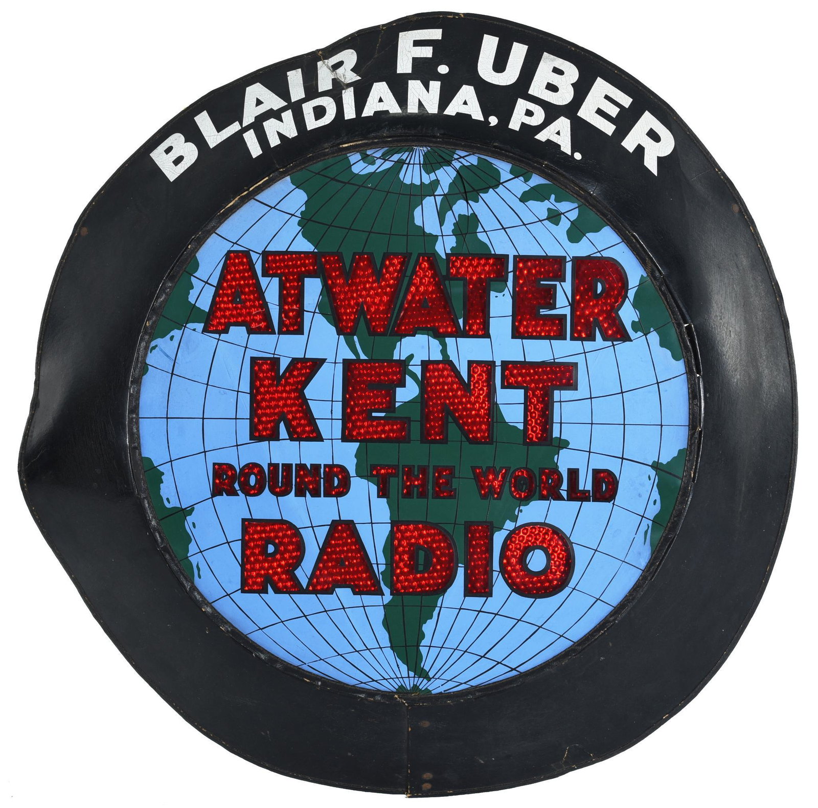 Atwater Kent Round The World Radio Reflective Sign: Single sided sign, has plastic face, the letters are clear, the back panel is red reflective material, holder is a pressed cardboard, face has a four inch crack coming down from 12 o'clock, the holder