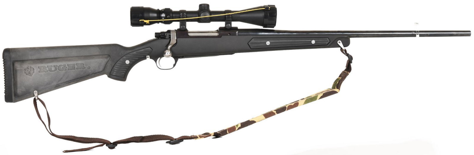 Ruger M77 Mark II Bolt Action .243 Win Rifle: 22" barrel. 98% bluing with minor wear/discoloration on the synthetic stock. Tasco 3X-9X scope. Excellent condition with excellent bore.