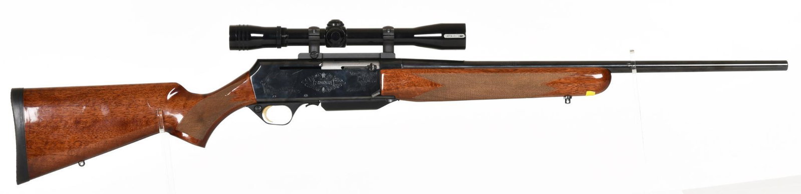 Browning BAR II Safari grade Semi Automatic .270 Rifle: 22" barrel. 98% bluing. Only minor wear and handling marks on stock and a scratch on the receiver. Lo-Pro Redfield scope with duplex reticle. Built in 1996. Sights have been removed.