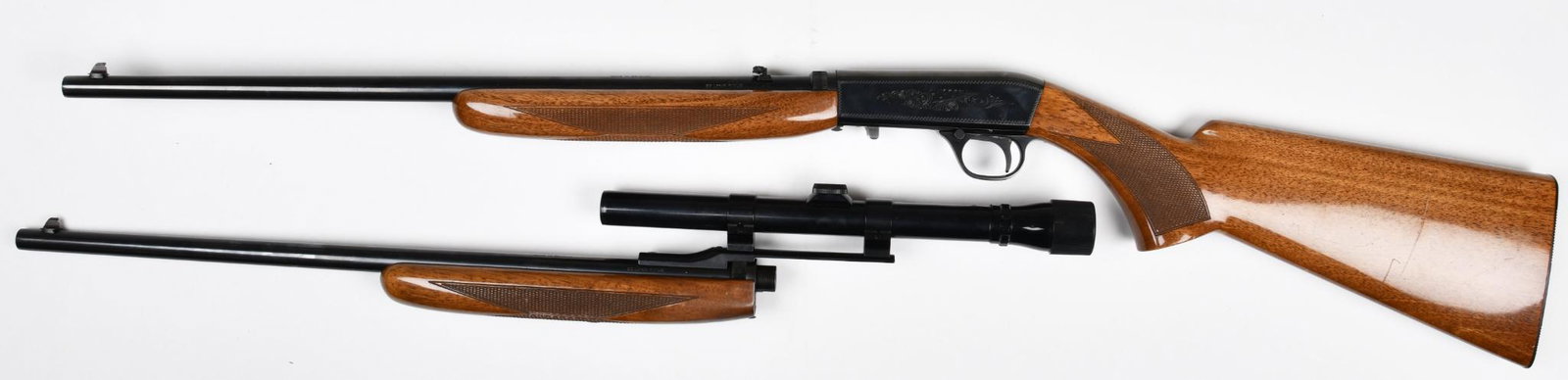 Browning .22 Caliber Semi Auto Rifle S#70T48656 made in: Comes with 2 barrels. One with iron sights and the other with a Weaver D4 scope on cantilever mount Has a scratch on the butt stock L#302