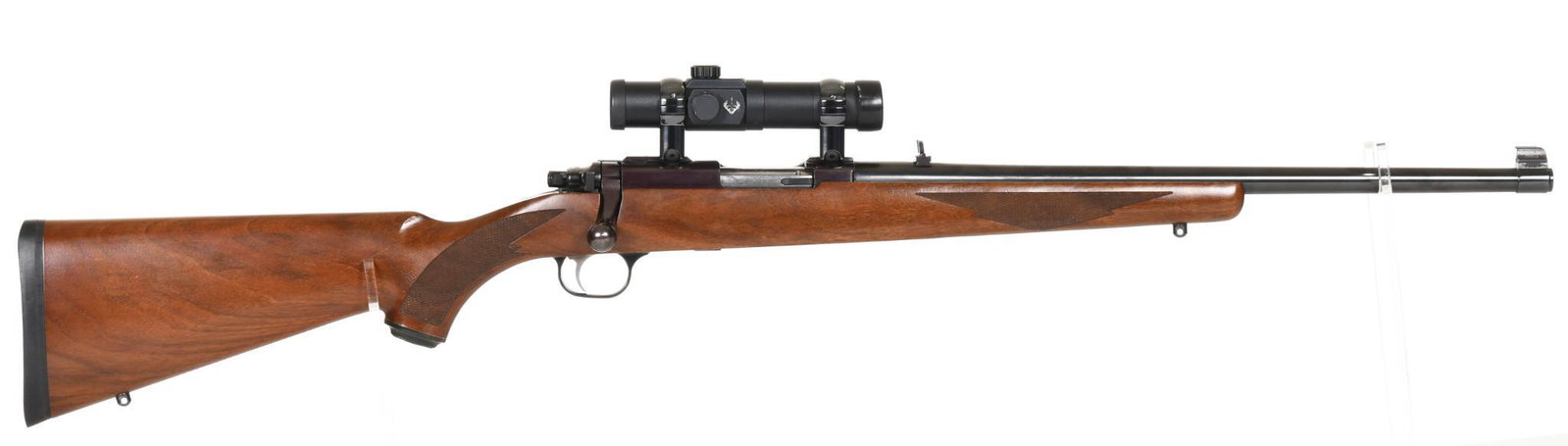 Ruger 77/44 Bolt Action .44 Rem Mag Rifle S#740-02481: 18.5" barrel. 98% bluing with minor handling marks on stock. Comes with Bushnell Trophy red dot sight. Very good condition.