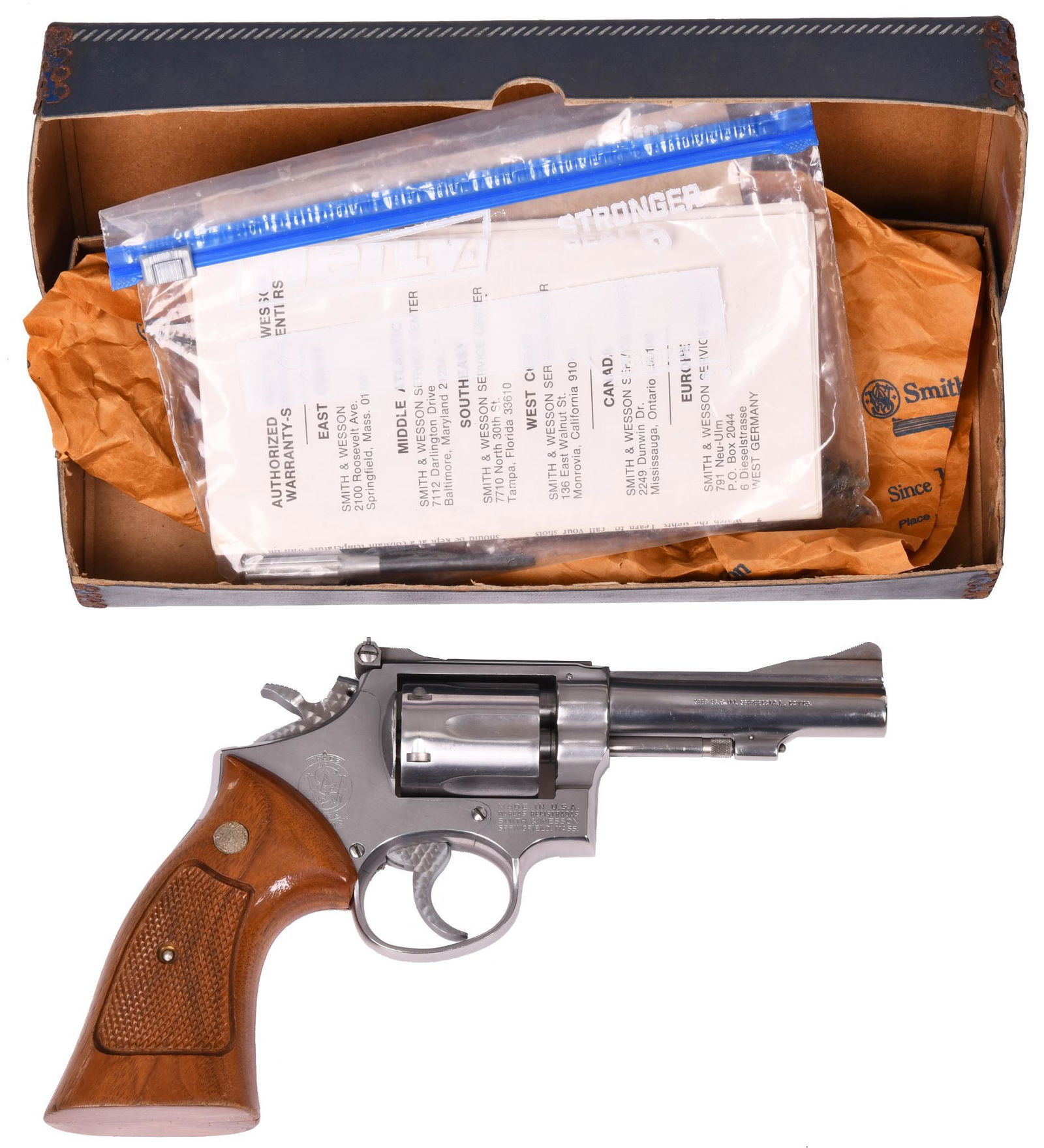 Smith & Wesson Model 67 No-Dash SN#5K1099 .38: 4" barrel 6 shot. The grip has minor handling marks.Not original box but period correct.