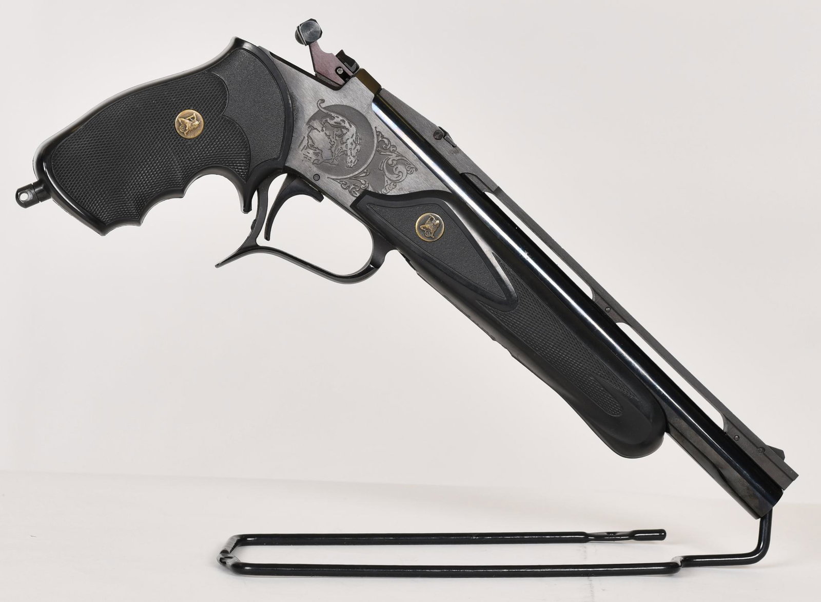 Thompson Center Contender .45 Colt Single Shot Pistol: 10" ribbed barrel. Flip down rear sight. 98% bluing with minor handling marks.