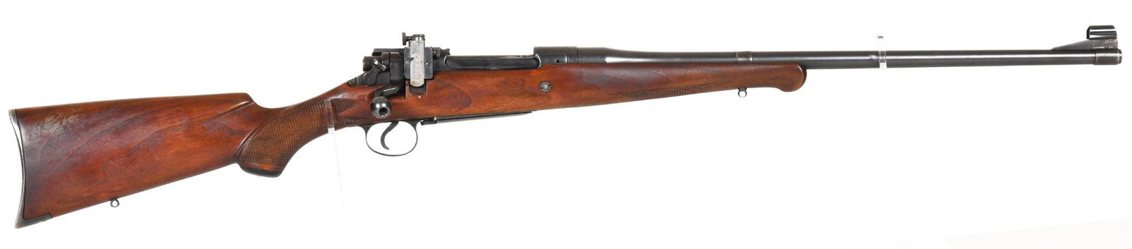 Remington Model 30 Express rifle 30-06 caliber Bolt: This is a 22" barreled gun with a Schnabel forend stock. Shows heavy carry wear but is in good working order. Nice Lyman peep from the factory.