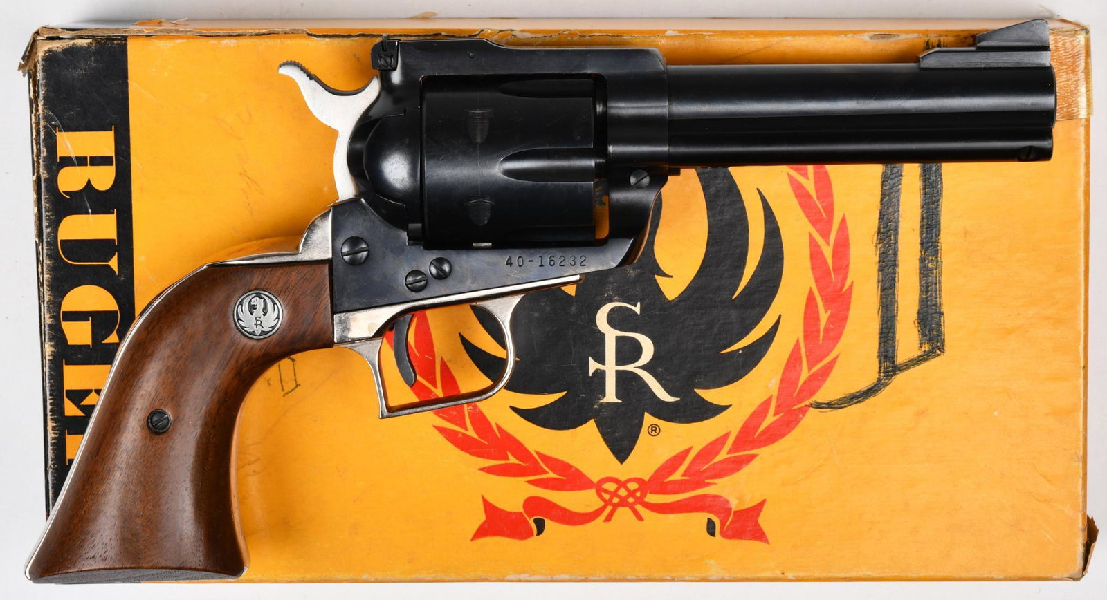 Ruger Blackhawk .41 Mag Revolver S#40-16232: Original Ruger box. 4 5/8" barrel. Three screw. The grip frame is a Super Blackhawk frame in the white. 98% blue elsewhere with minor handling marks. Faint turn line.