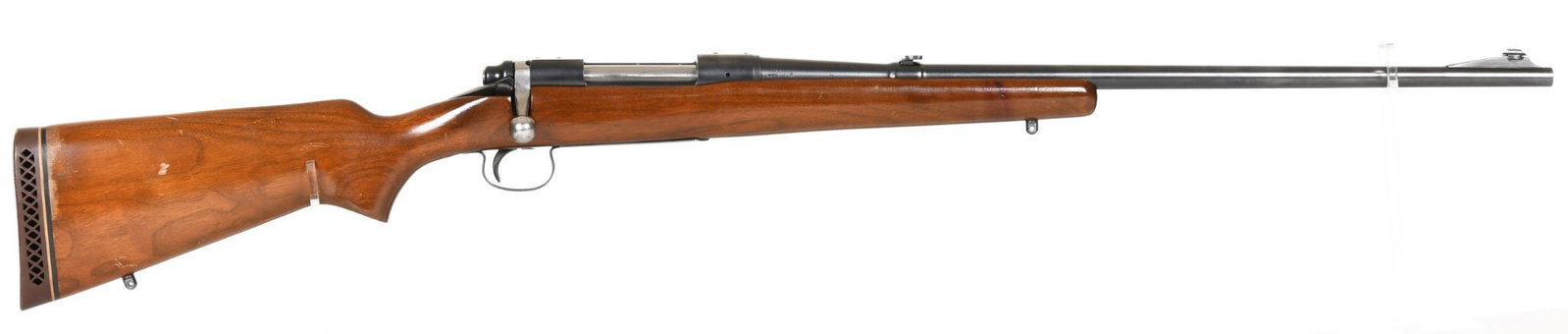 Remington Model 721 Bolt Action .270 Win Rifle S#327498: 24" barrel. 95% bluing with handling marks and scratches on the stock. Flip down rear sight.