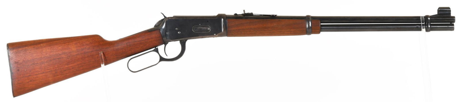 Winchester Model 94 Lever Action .32 Win Spl. Rifle: 20" barrel. Built 1956. 60% bluing. There is patina in a number of areas.