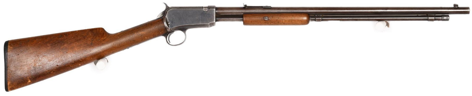 Winchester Model 1906 .22 Caliber Pump Action Rifle: 40% blue. Heavy wear on stock.Action is solid.