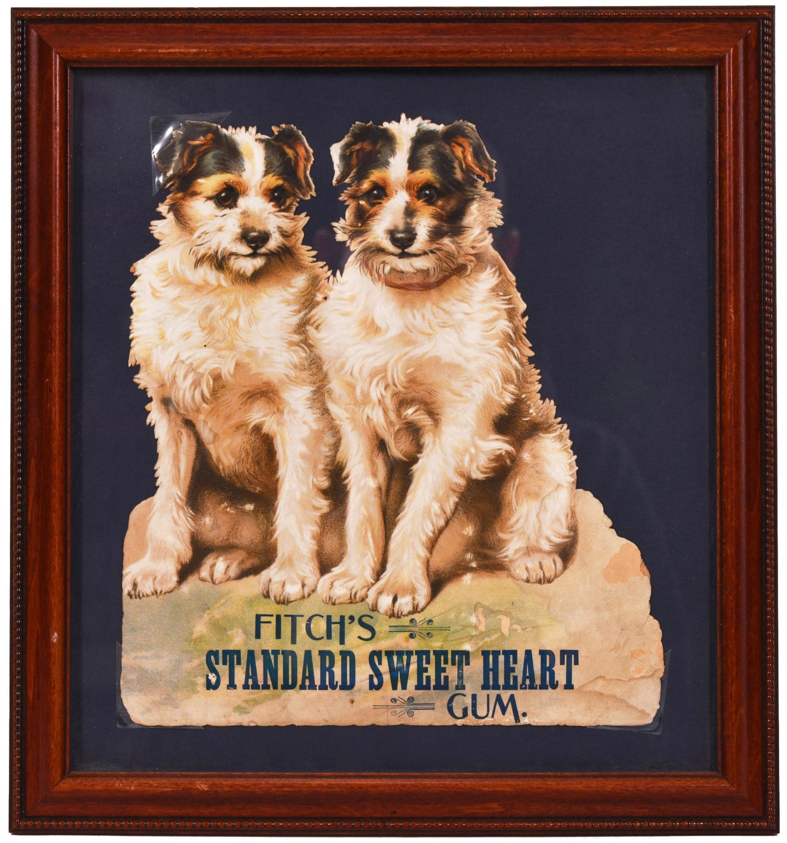 Fitch's Standard Sweet Heart Gum w/Dogs Cardboard Sign: Single-sided diecut cardboard sign, under glass, has good color, shows minor paper wear around the perimeter, 10"x9", rated 8