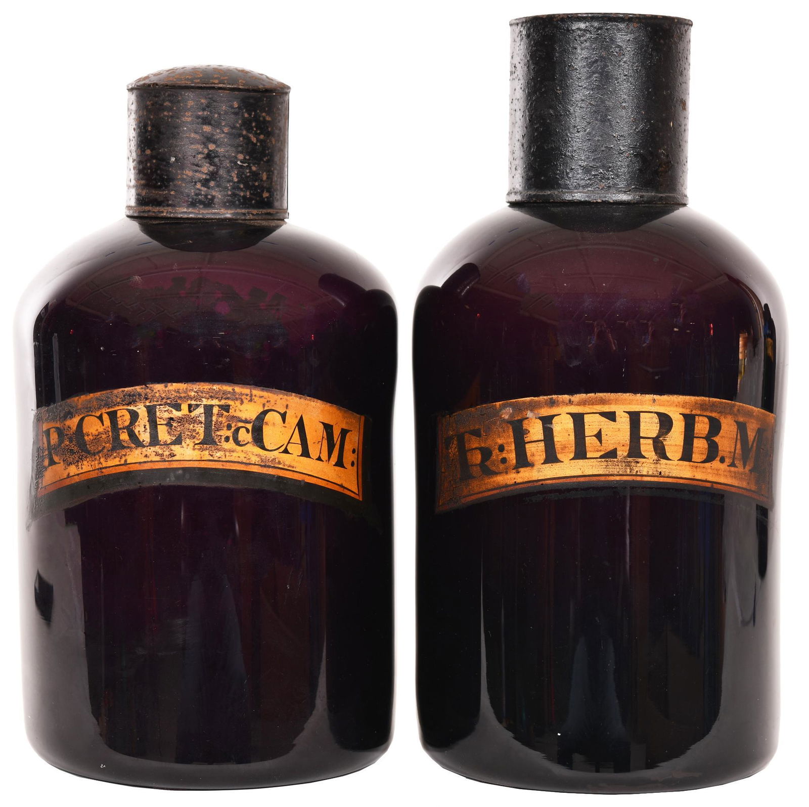 2-Early 19th Century Deep Amethyst Apothecary Jars: Hand blown jar and stopper, ground pontils both are in excellent condition, has the label, P:Cret" & Herb.M, displays well, 13.5"T., rate 9