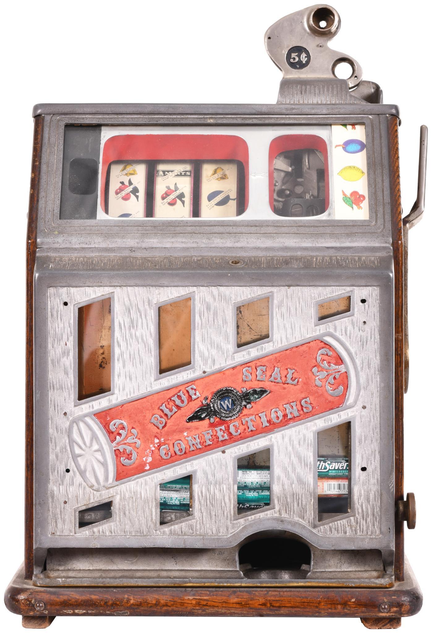 Walting 5 Cent Blue Seal Confections Slot Machine: Working condition. The vendor is stuck and one of the flips appears to be broke off. It displays well. Shows some wear throughout with a few extra holes drilled in the front. Has been repainted. Has t