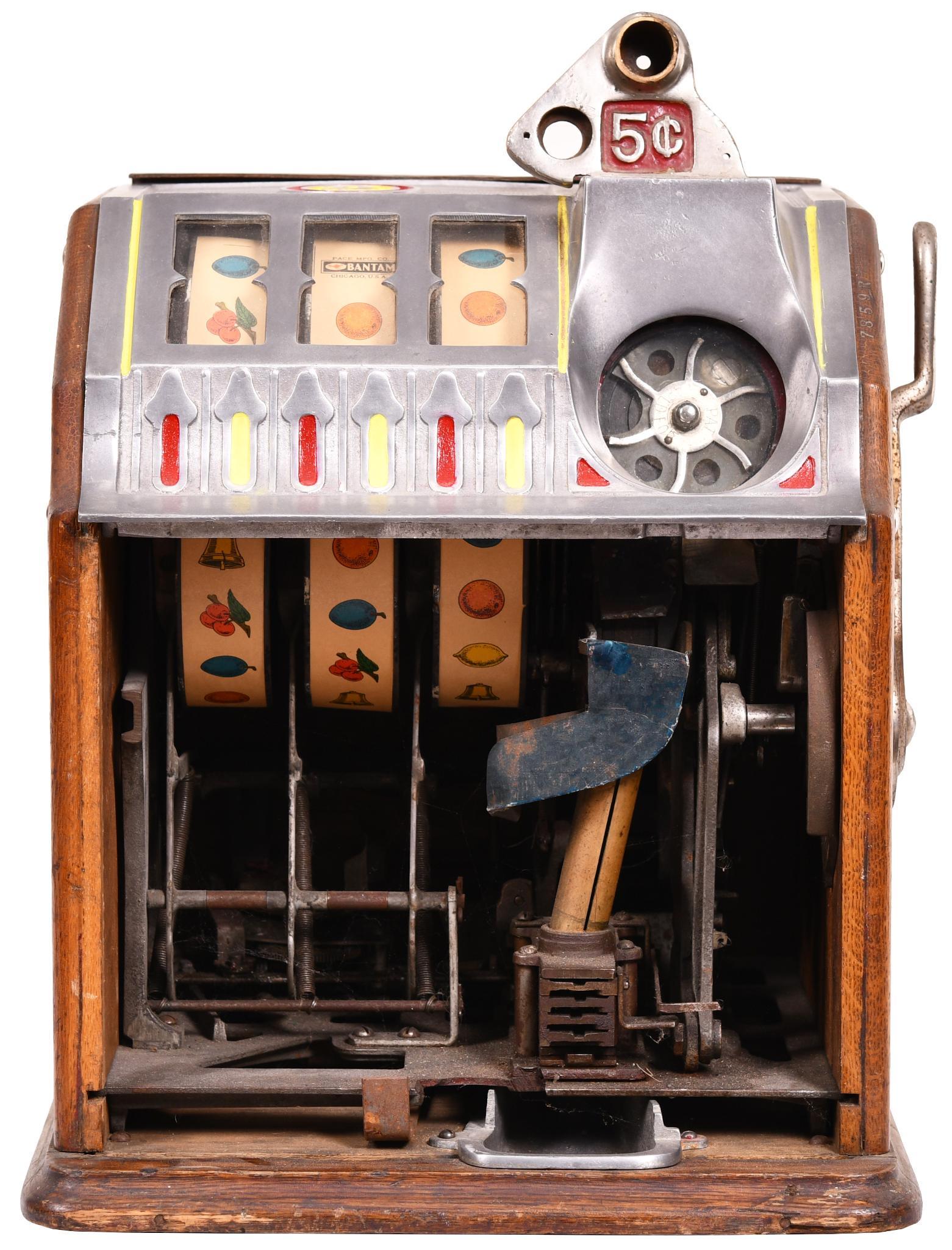 Pace 5 Cent Slot Machine Parts: Shows wear. Needs to be restored or used for parts. Missing some parts. Doesn't work. 19"x14.25"