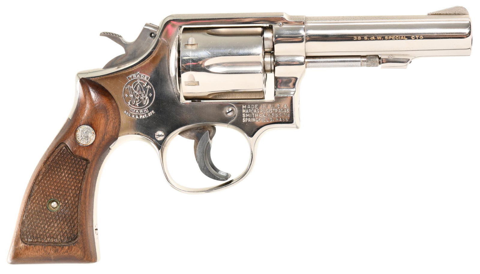 Smith & Wesson 10-6 .38 Special Double-action Revolver: Nickel finish. 4" heavy barrel. 6-shot. Fairly good factory grips. Has an Ace trigger shoe. 100% nickel coverage with light patina on the frame and the barrel.
