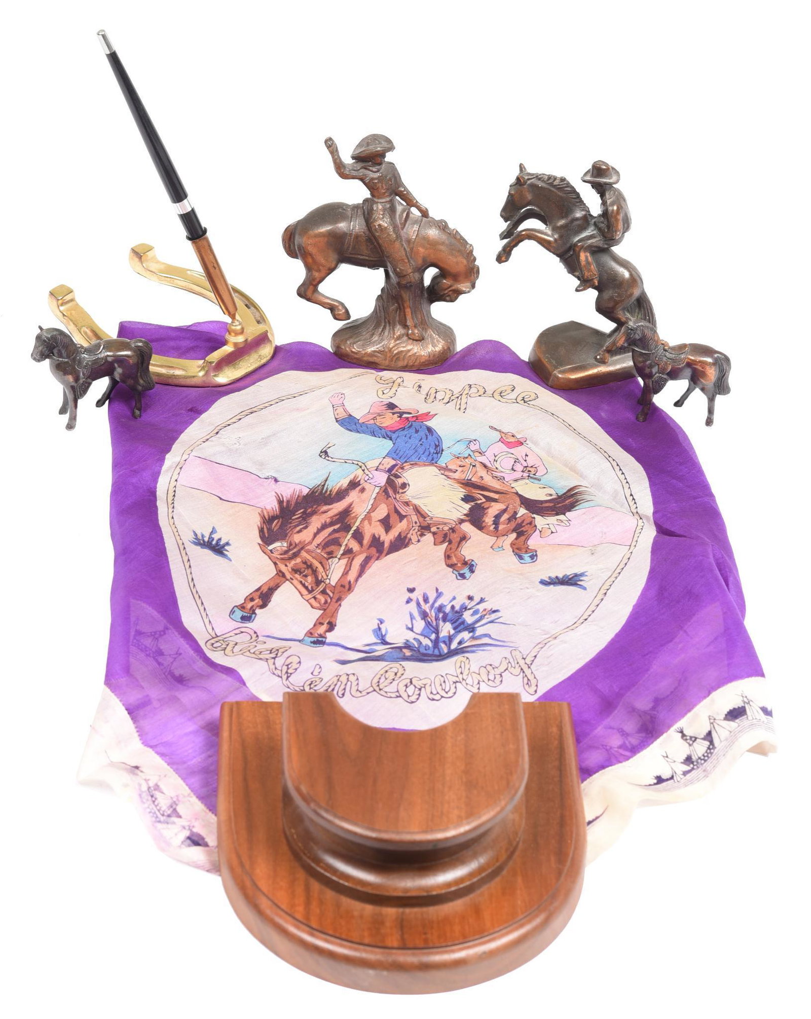 Lot Of Western Memorabilia: Horse Shoe pen holder, horse figurines, and "Yippee Ride em' cowboy" banner. All in good condition.
