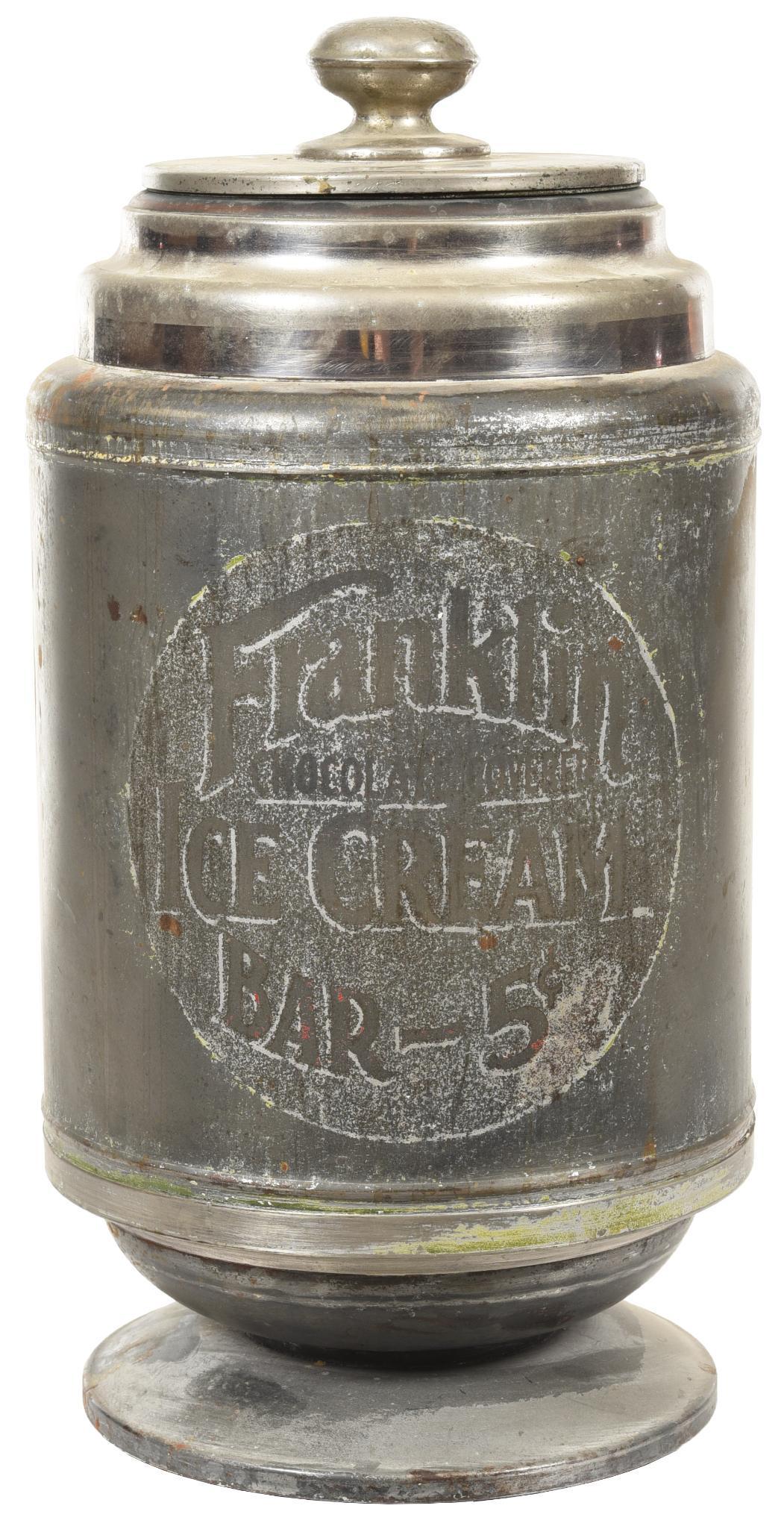 Franklin Chocolate Covered Ice Cream Bar Container: Metal insulated counter jar, label is in poor condition, shows some wear, 17"T.