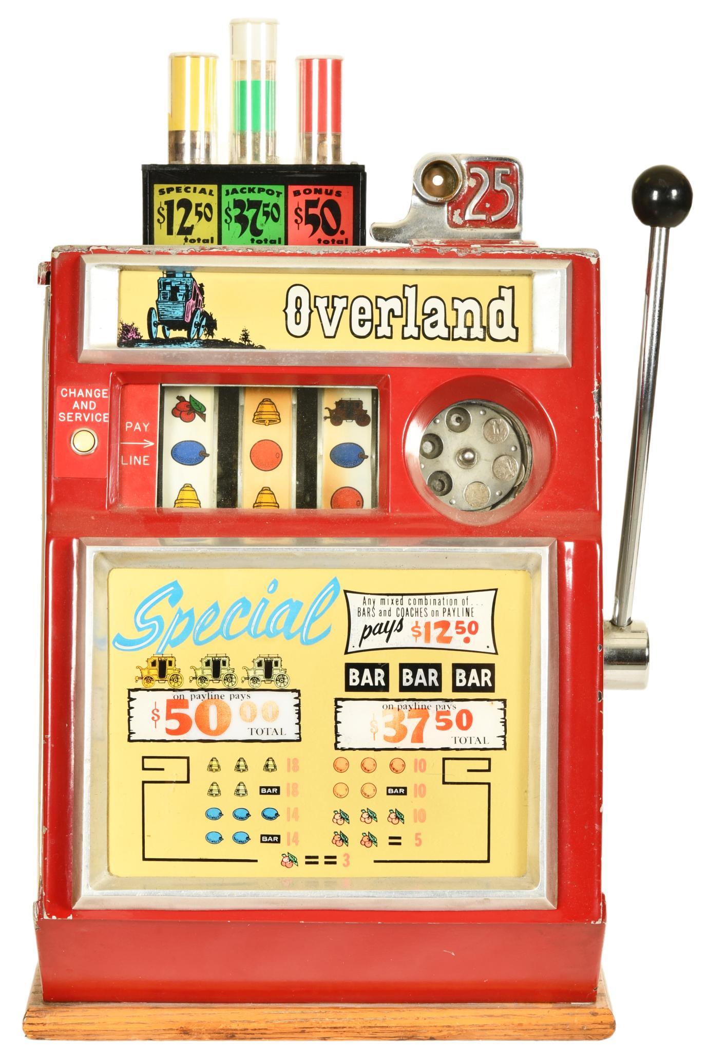 3-Wheel 25 Cent Slot Machine from The Overland: In good original condition, works well, has its key, has lights, 28"x18"x15", rated 6.75