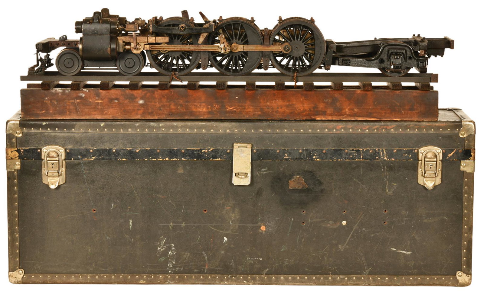 Railway Undercarriage Model In Case: Functional railway undercarriage model on wooden tracks, metal and wood construction, heavy, shows signs of wear throughout, displays well and has a great look, not original case, model is 8.5x37.5x8.