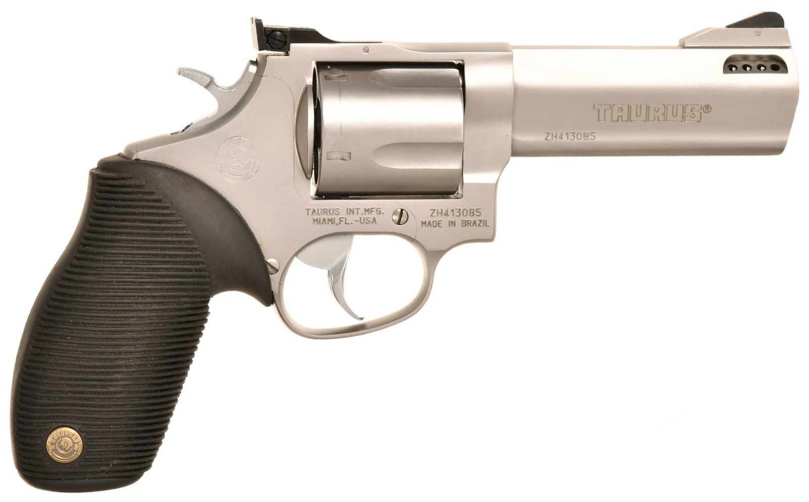 Taurus Tracker .44 Magnum Double Action Revolver: 4" barrel, rifling is sharp, action is smooth, shows very few signs of wear from handling or shooting, comes with original case and paper work, overall revolver is in excellent used condition, B2 L 57