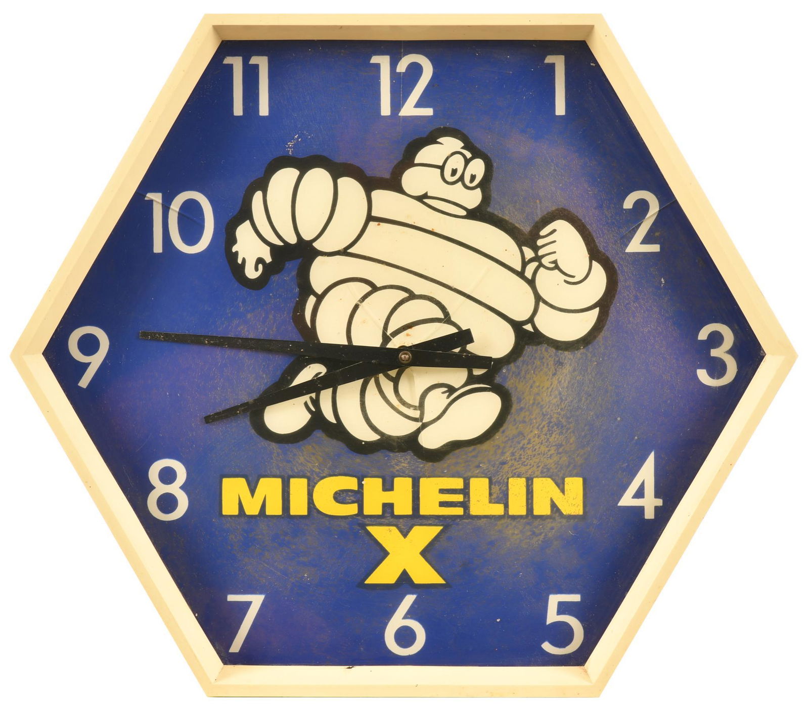 Michelin Kolux Lighted Clock: Lights up and clock hands move, face is plastic and shows paint loss with a few cracks, 14"x16", rated 7.25