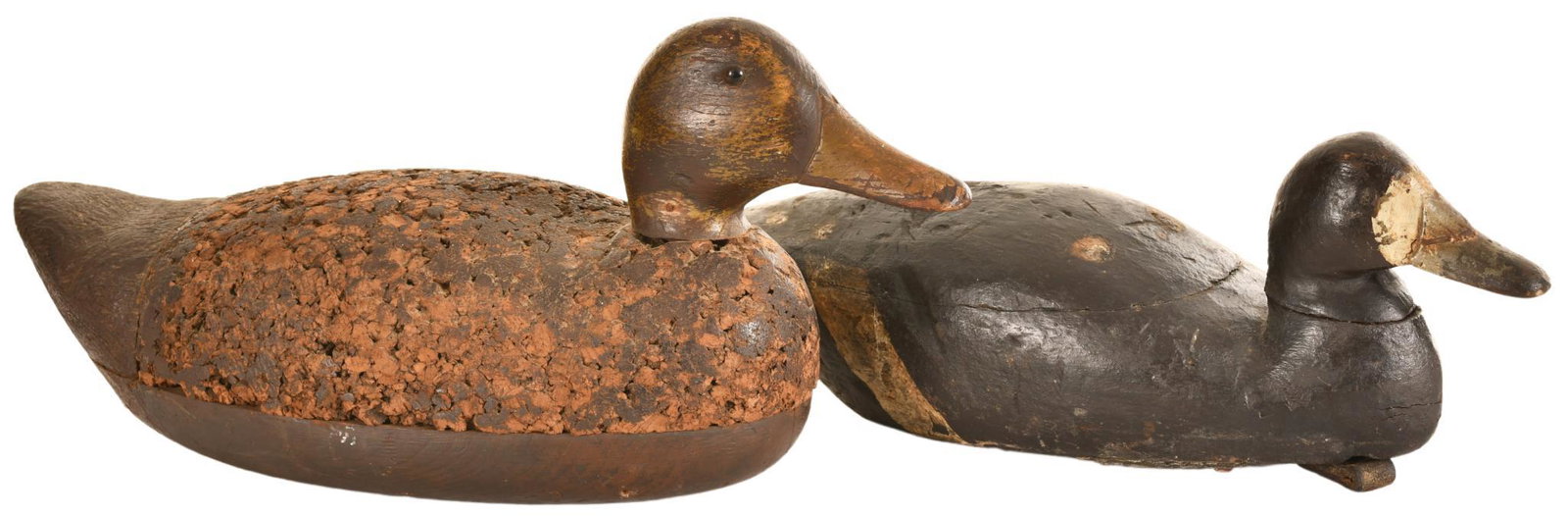Lot of 2 Antique Duck Decoys: Wooden and cork construction, both have weights, both show signs of wear, use, paint loss, paint over, discoloration, chipping and some small cracks in the wood, display exceptionally well and have a 