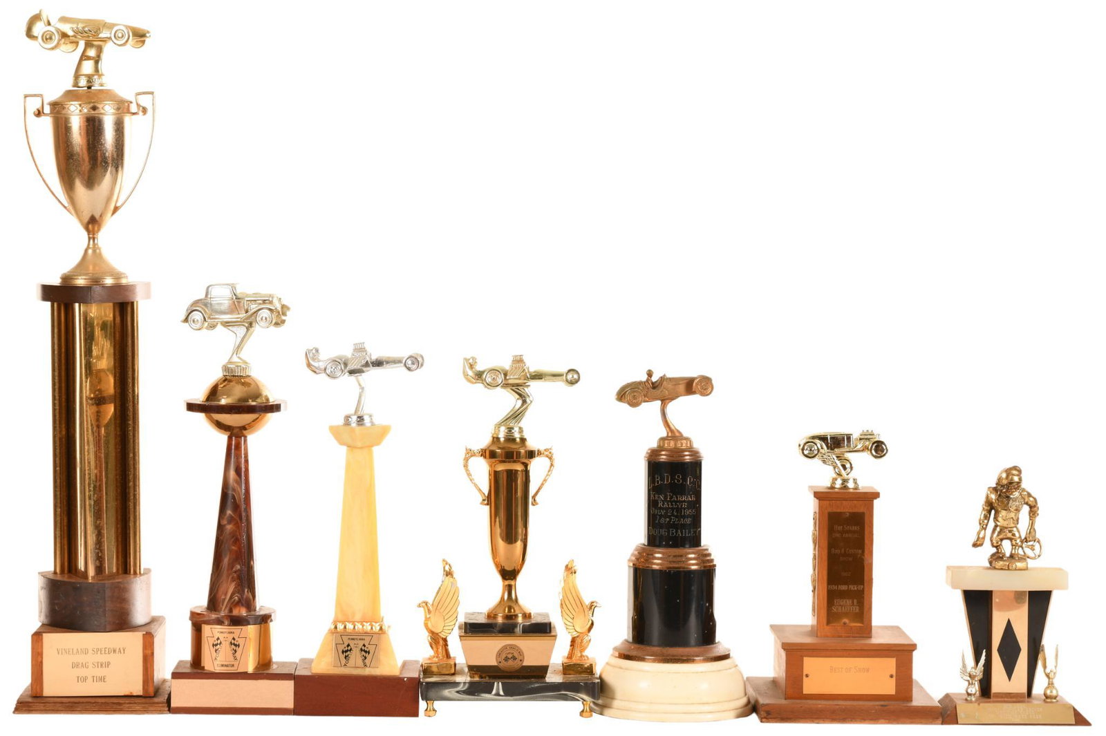Lot of 7 Automotive Trophies: Show wear and paint loss throughout, display very well, 30" tall or less