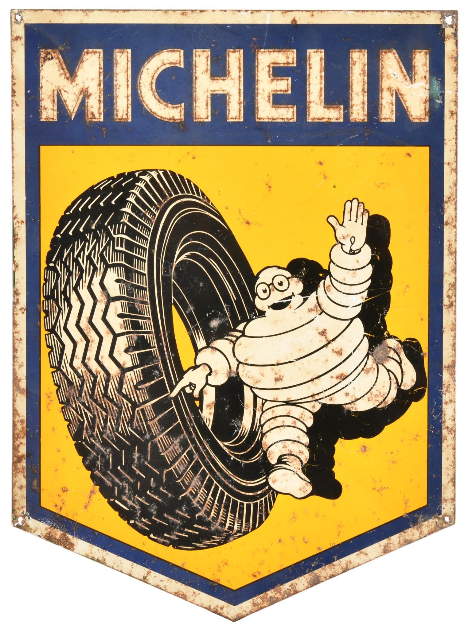 Michelin w/Bibendum & Tire Metal Sign: SSTE, has average-fair color and gloss, shows wear, paint loss, and discoloration throughout, displays well, 16.75"x12.25", rated 6.5