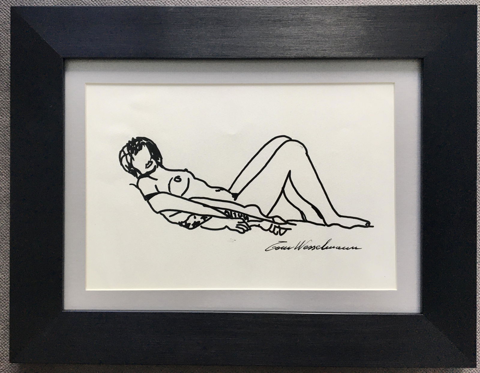TOM WESSELMANN MARKER ON PAPER PAINTING: IN THE STYLE OF TOM WESSELMANN BLACK MARKER ON PAPER. FRAME SIZE: 17.5 X 13.5 INCHES. RECLINING NUDE. Drawing has not been inspected outside the frame. No Coa. Imitation wood frame. Thomas K. Wesselma