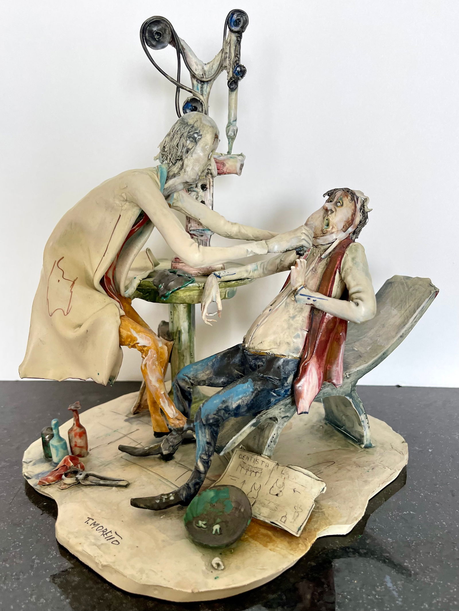 Toni Moretto Sculpture/ Lo Scricciolo Pottery Dentist: Toni Moretto (Italian, 1929-2011) Ceramic Hand Built Dentist. Unique Highly stylized and detailed Ceramic Construction. Signed on front bottom and made in Italy to bottom.