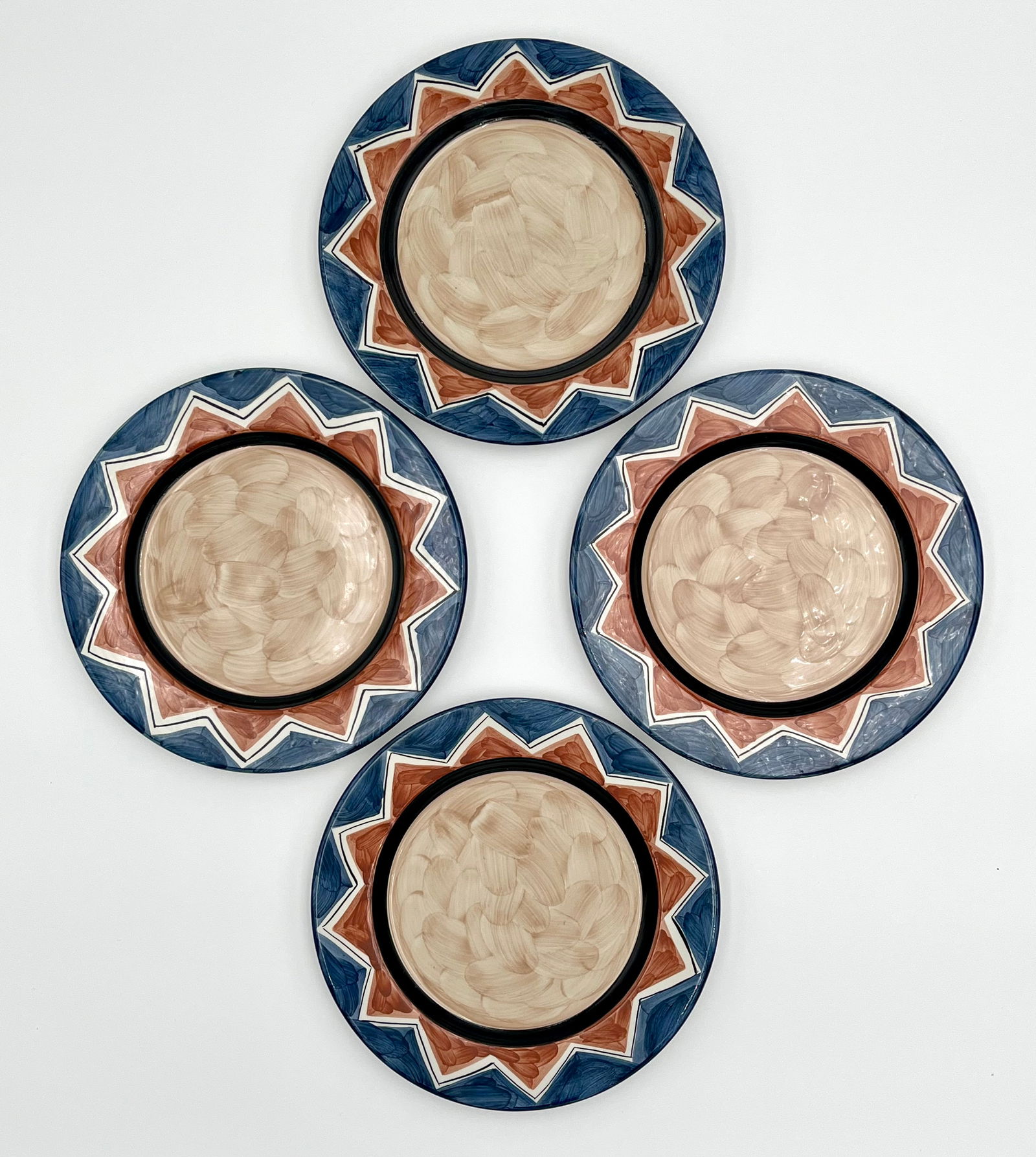 Set of 4 Vintage Alcobaca Hand-Painted Portuguese Pottery (Earthenware) Plates: Beautiful set of 4 vintage Portuguese plates by RB Alcobaça, all hand-painted with bold geometric starburst motifs.• Maker/Origin: RB Alcobaça, Made in Portugal (stamped)• Size: 8.2”