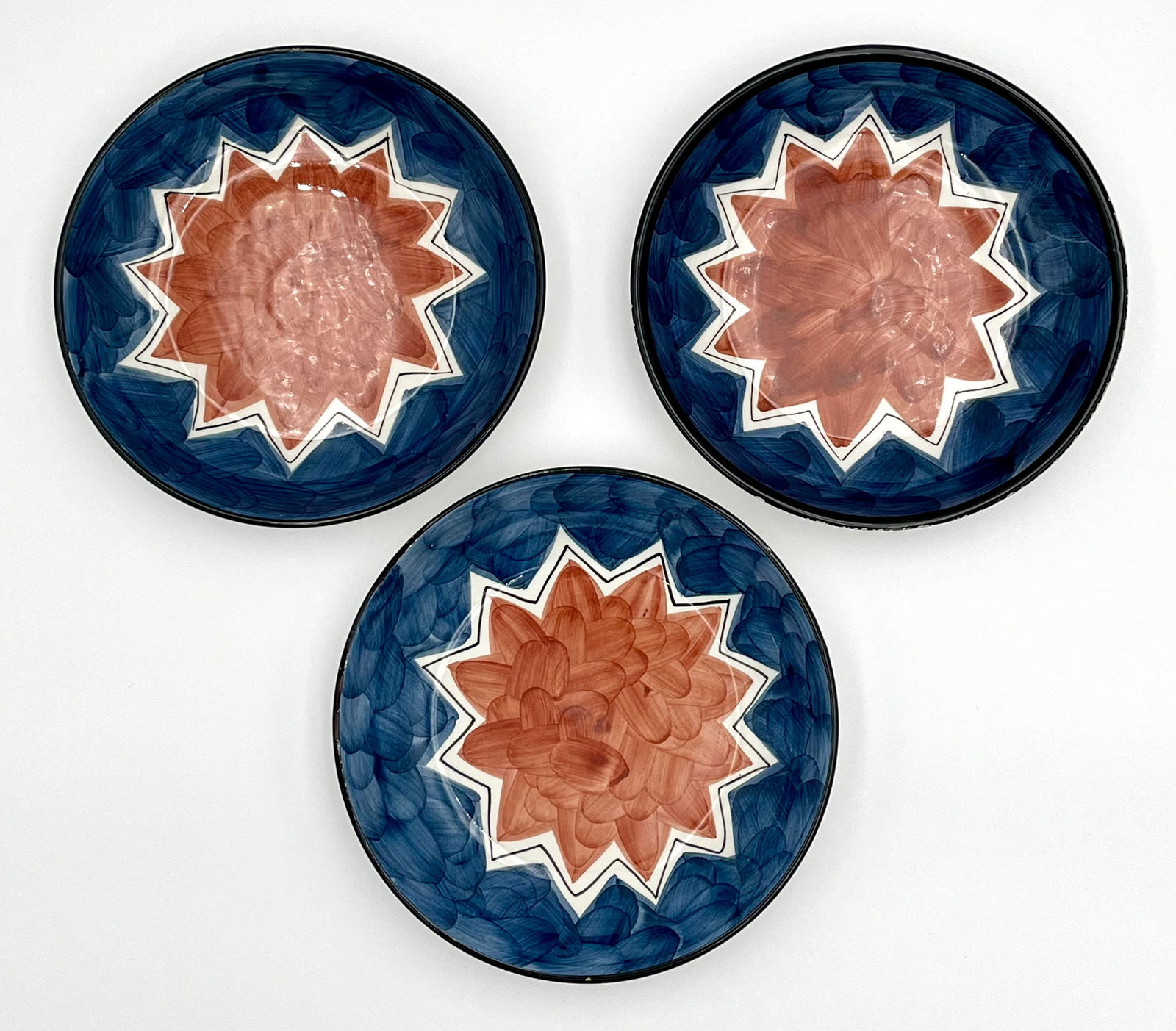 Set of 3 Vintage Alcobaca Hand-Painted Portuguese Pottery (Earthenware) Bowls: Set of 3 vintage Portuguese shallow bowls by RB Alcobaça, hand-painted in bold geometric starburst motifs.• Maker/Origin: RB Alcobaça, Made in Portugal (stamped)• Size: 7.7” diameter