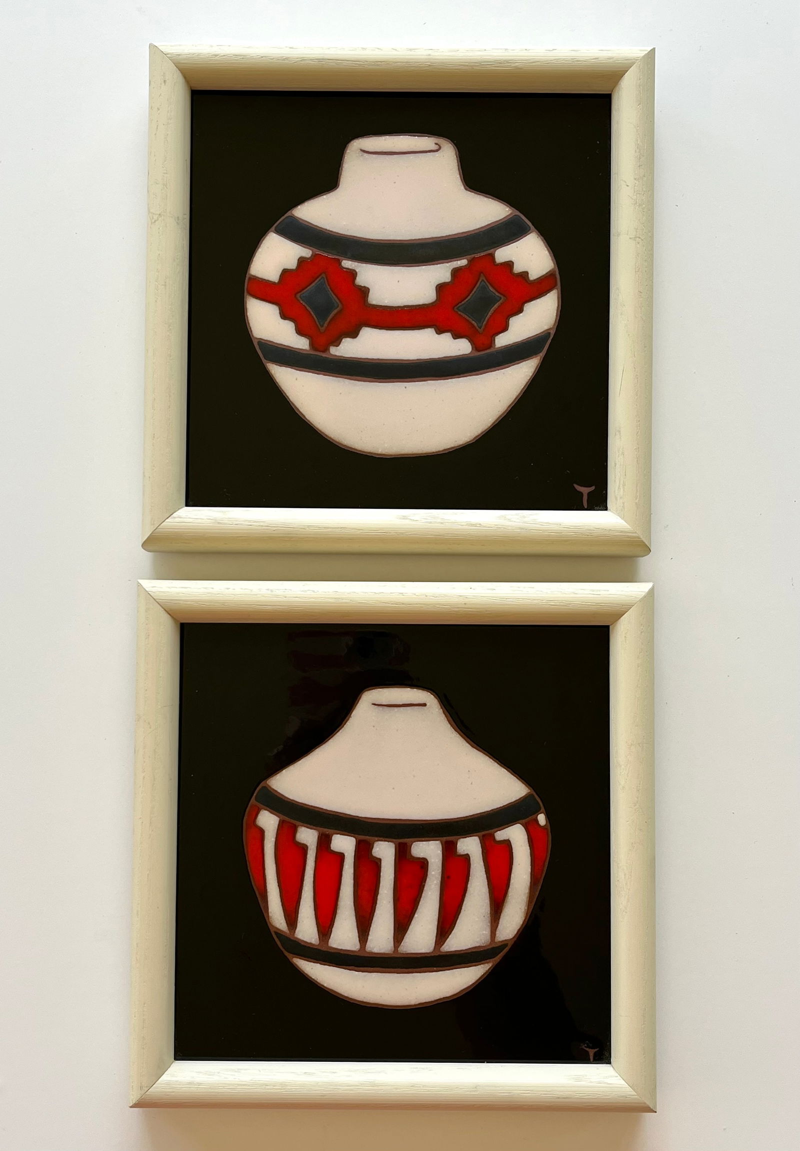 Pair of Framed Southwest Pottery Design Ceramic Tiles – Boho Decor: Set of two decorative ceramic tiles featuring stylized Southwest Native-inspired pottery designs in bold red, black, and white on a glossy black background. Each frame measures approximately 6.7&rdquo